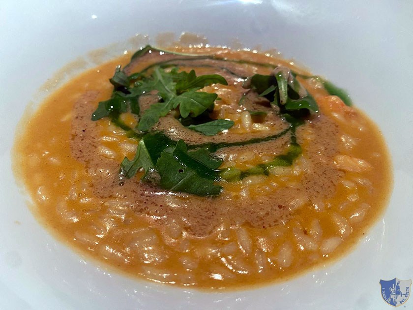 Risotto con mazzancolle nocciola e rucola