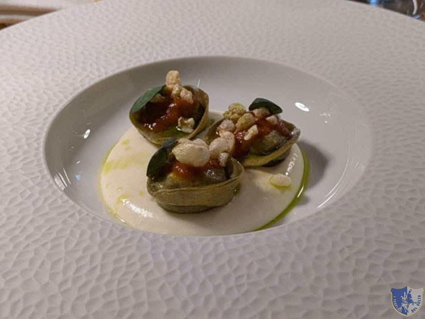 I tortelli di grano arso in farcia di bracioletta con spuma di caciocavallo podolico e olio al finocchietto selvatico
