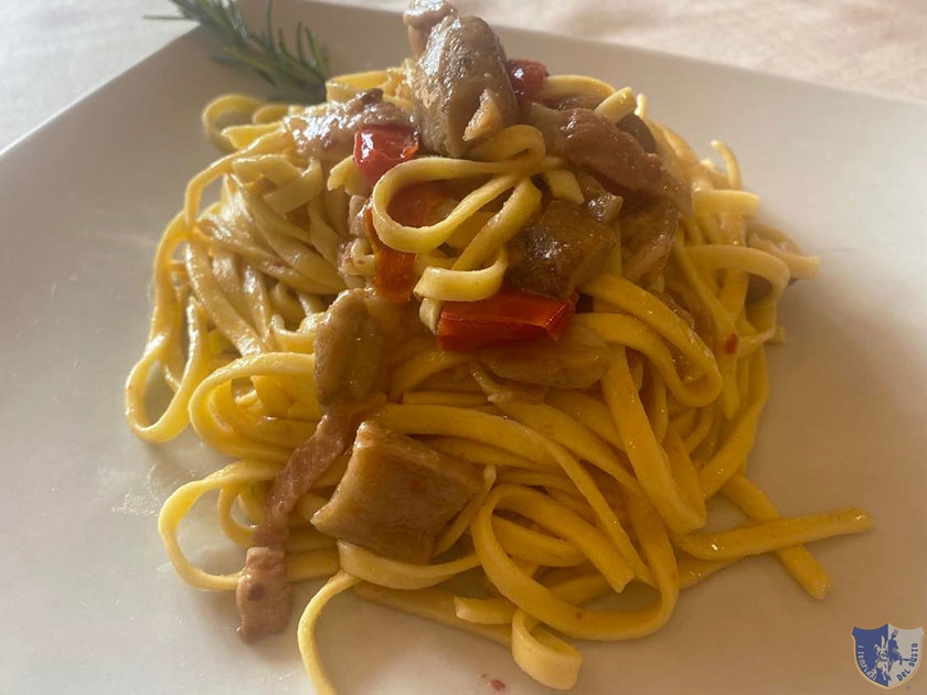 Le fettuccine con porcini e guanciale