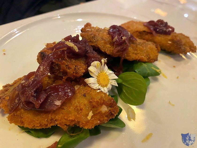 Alici ripiene con provola con scorzetta di limone bio e cipolla caramellata