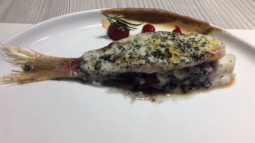 Parmigiana di triglia con crema di melanzana marinata e pomodoro confit