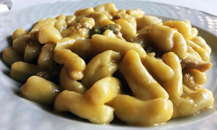 Gnocchi con zucca e salsiccia